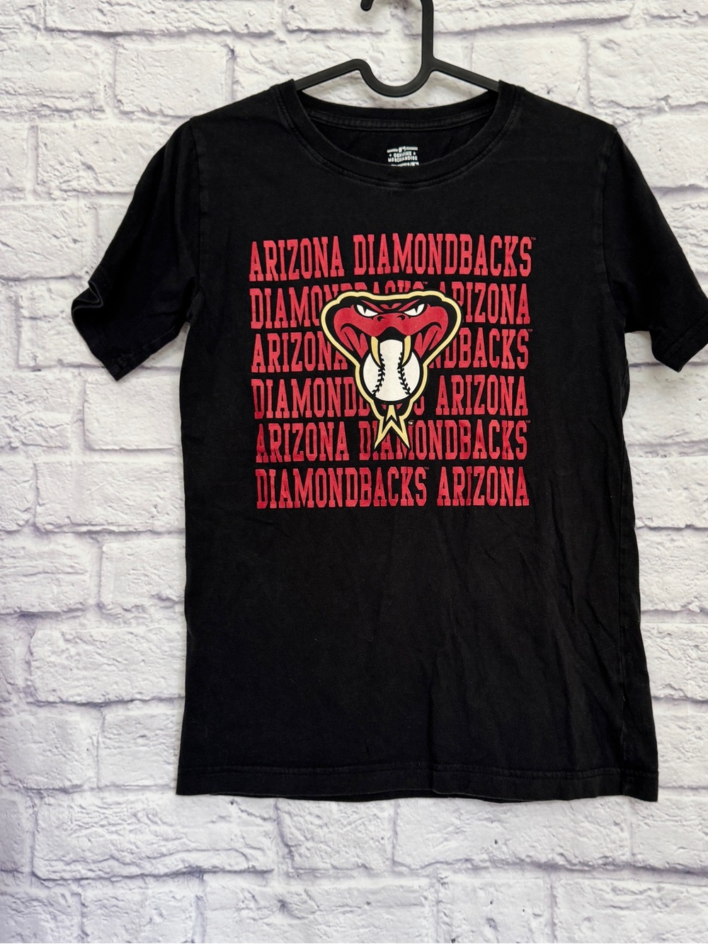 Genuine Merchandise Black Tee with White Logo